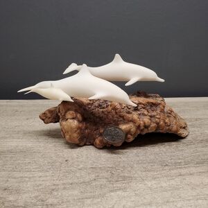 John Perry dolphin sculpture